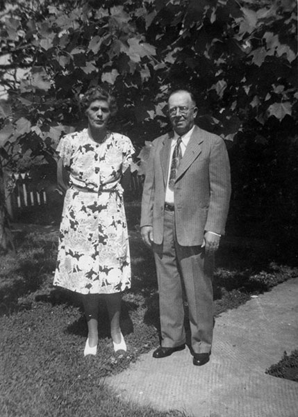 Lillian and James Earl Carter standing side by side (black and white image).