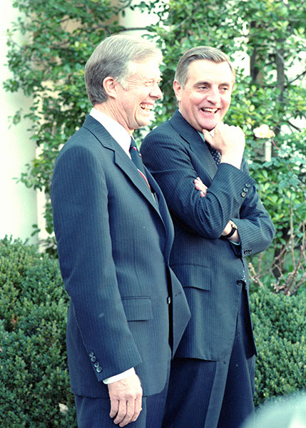 President Carter and Vice President Walter Mondale enjoy a laugh.