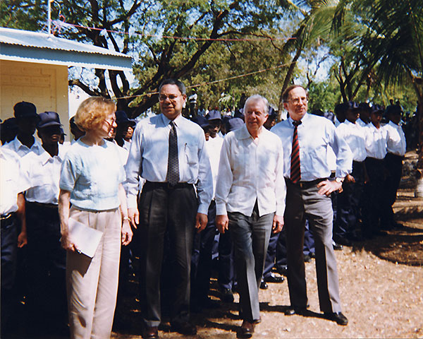 Rosalynn Carter, Colin Powell, Jimmy Carter, and Sam Nunn in Haiti.