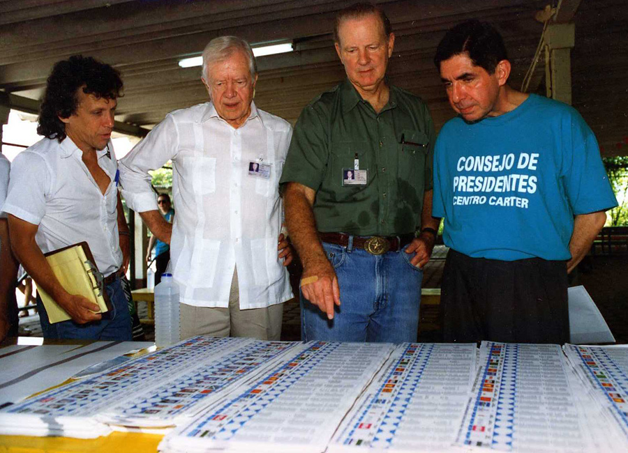 Jimmy Carter,  James Baker,  and Oscar Arias Sanchezin in Nicaragua circa 1996. 