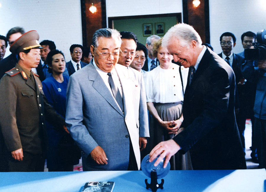 Jimmy Carter and Kim Il-Sung.