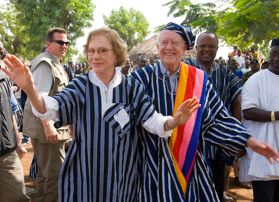 Jimmy and Rosalynn Carter wearing traditional Ghanaian attire.