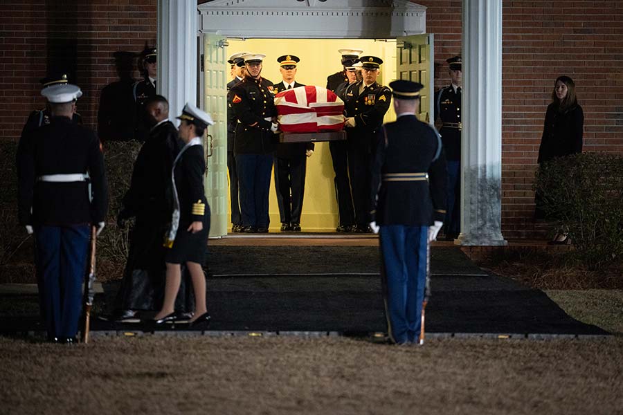 President Carter’s casket is borne out of Maranatha Baptist Church.