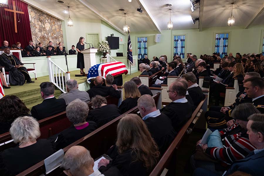 A private funeral service takes place inside Maranatha Baptist Church.