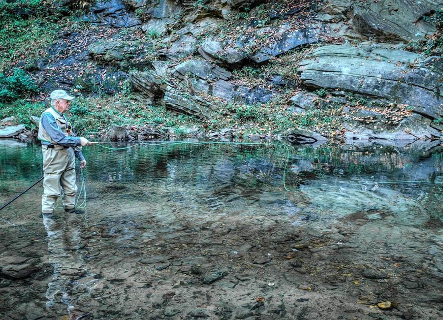 Jimmy Carter fly fishing in Alaska.