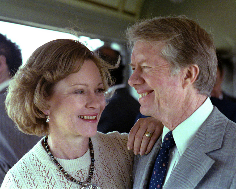 President and Mrs. Carter on a train.